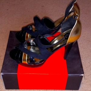 Sexy strappy black and gold platform heels. Never worn.